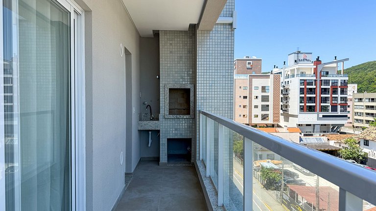 407- Apartamento 2 suítes próximo a praia