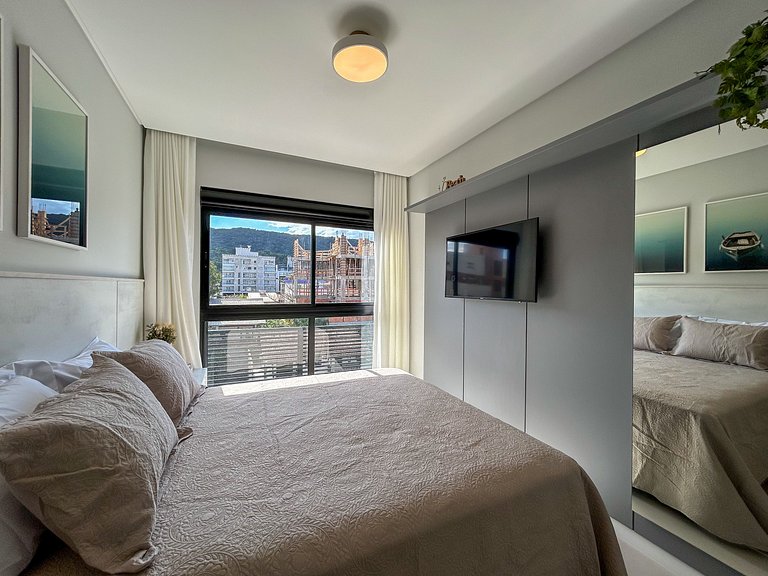 133 - Lindo apartamento na praia de Bombas