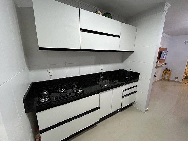 068 - Apartamento de três dormitórios na praia de Bombas